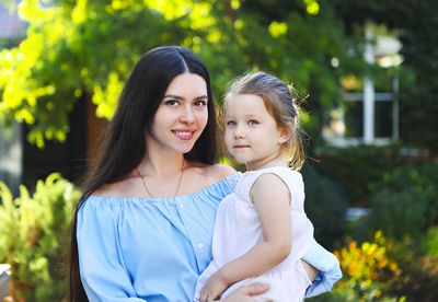 Portrait of mother and daughter