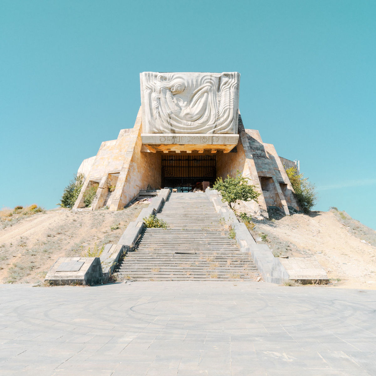 architecture, sky, clear sky, built structure, day, nature, no people, sunlight, travel destinations, the past, history, ancient, staircase, the way forward, building exterior, place of worship, blue, direction, tourism, ancient civilization, outdoors, archaeology