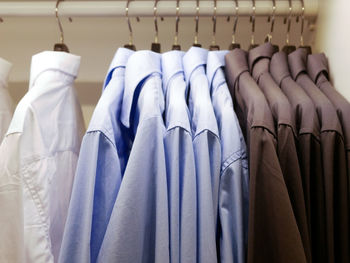 Clothes drying on rack in store