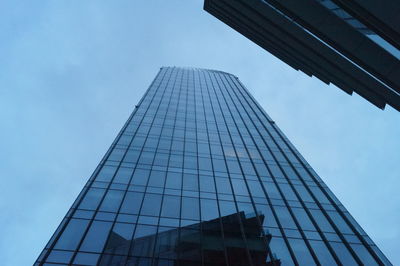 Low angle view of skyscrapers against clear sky