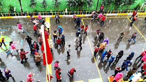 High angle view of crowd during rainy season