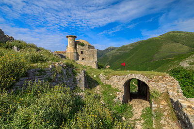 Low angle view of old ruins against sky