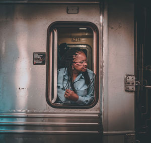 Portrait of man in train