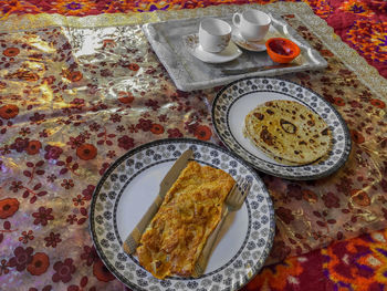 High angle view of breakfast served on table