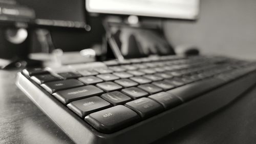 Close-up of computer keyboard on table