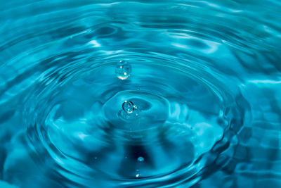 High angle view of water falling in swimming pool