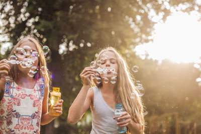 Full length of a girl with bubbles