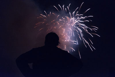 Firework display at night