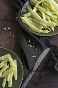 High angle view of chopped vegetables in bowl on table