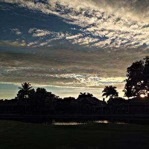 Scenic view of landscape against cloudy sky