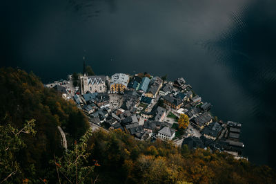 High angle view of townscape by sea