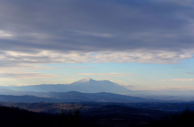 Scenic view of mountains against sky during sunset