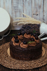 Close-up of chocolate cake on table at home