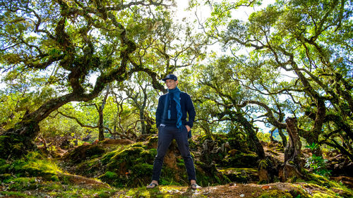 Man standing in forest