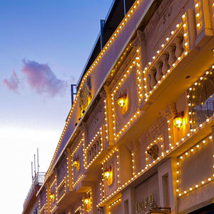 Low angle view of illuminated building at night