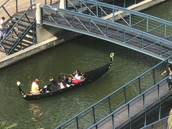 High angle view of people on bridge over river