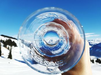 Close-up of ice cream against blue sky