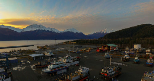 High angle view of harbor against sky during sunset