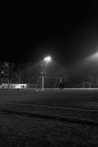 People on field at night