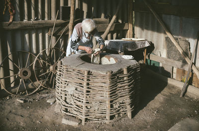 Man working in basket