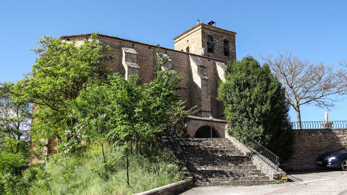 Low angle view of old building against sky