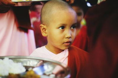 Close-up of cute monk in temple