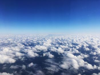 Aerial view of clouds against blue sky