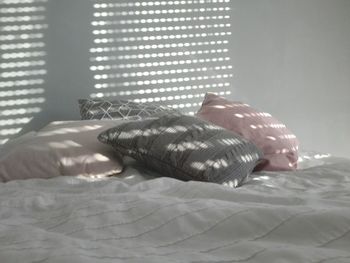 Low section of person on bed