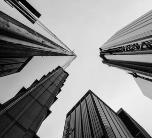 Low angle view of modern buildings against clear sky