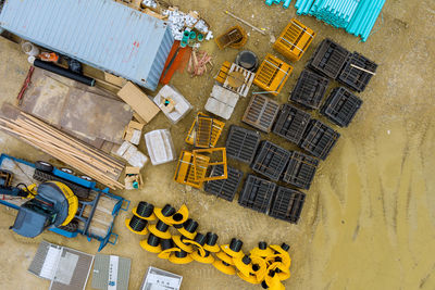 High angle view of yellow construction site by building