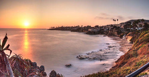 Panoramic view of sea against sky during sunset