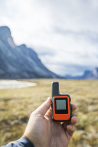 Explorer holding gps used for navigation and communication.