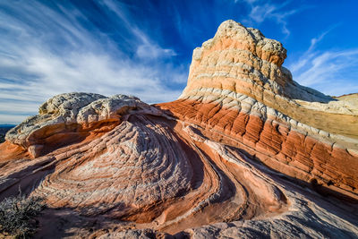 Panoramic view of rock formations against sky