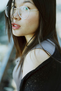Close-up portrait of young woman