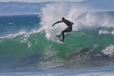Man surfing in sea