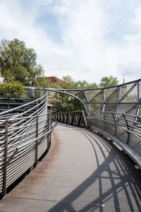 Footbridge against sky