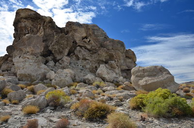 Scenic view of rocks against sky