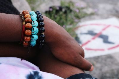 Close-up of woman hand with text