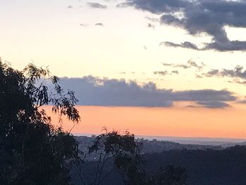 Scenic view of silhouette landscape against sky during sunset