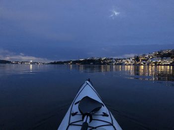 Scenic view of river against sky at night