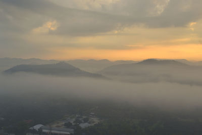 Scenic view of mountains against sky during sunset