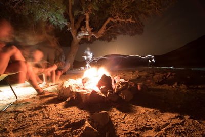 Tent on rocks at night