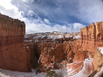 Panoramic view of rock formations against sky