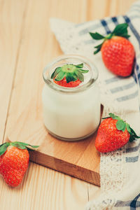 High angle view of strawberries on table