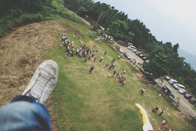 People on grassy field