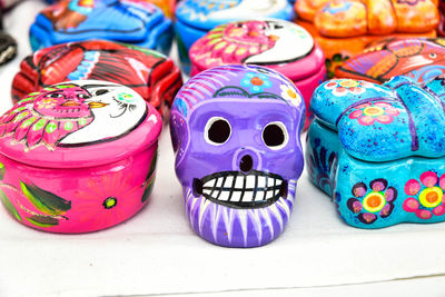 Close-up of multi colored decorations at market for sale