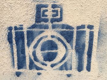 Close-up of text on wall