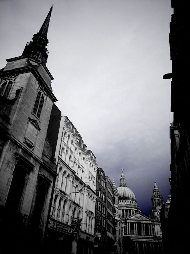 architecture, building exterior, built structure, low angle view, sky, city, history, religion, building, church, cloud - sky, outdoors, travel destinations, day, place of worship, no people, cathedral, cloud