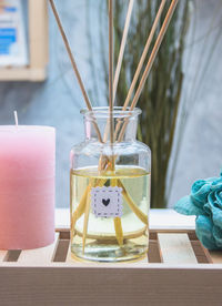 Close-up of glass jar on table