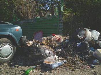 View of abandoned car on land